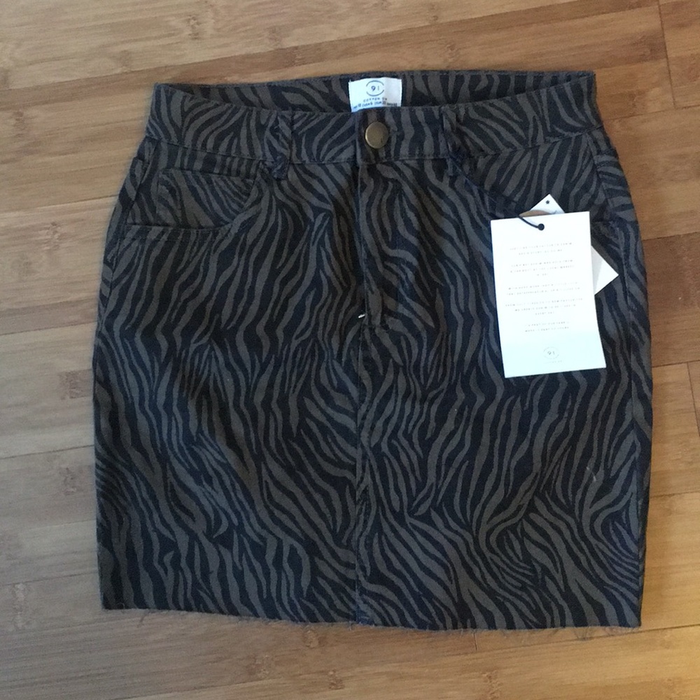 Denim mini skirt zebra print. Size 6